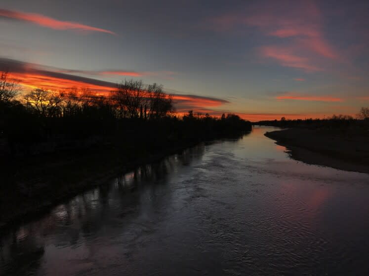 Red Buff, CA - January 22: The predawn glow reflects in the Sacramento River in Red Bluff. (Allen J. Schaben / Los Angeles Times)