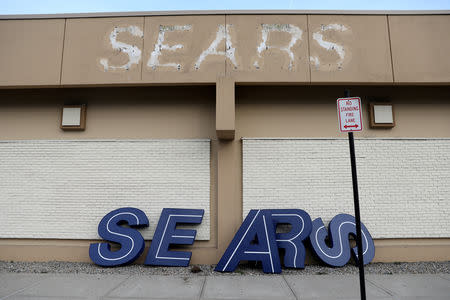 FILE PHOTO: A dismantled sign sits leaning outside a Sears department store one day after it closed as part of multiple store closures by Sears Holdings Corp in the United States in Nanuet, New York, U.S., January 7, 2019. REUTERS/Mike Segar/File Photo