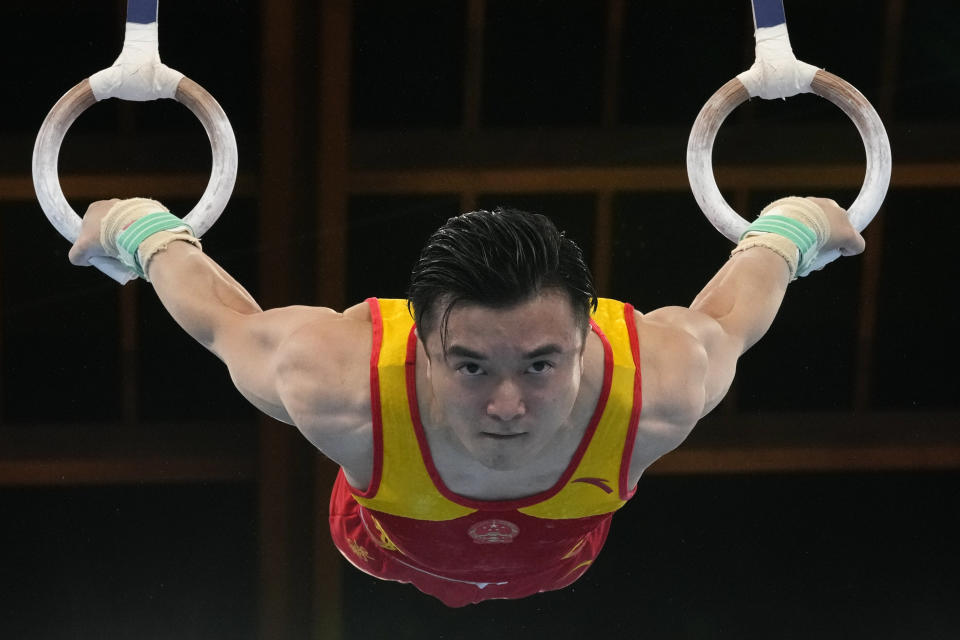 Liu Yang, of China, performs on the rings during the artistic gymnastics men's apparatus final at the 2020 Summer Olympics, Monday, Aug. 2, 2021, in Tokyo, Japan. (AP Photo/Ashley Landis)