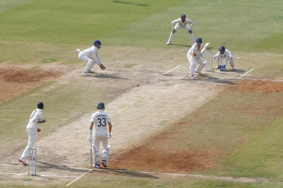 Australia's Travis Head, second right, prepares to play a shot during the third day of third cricket test match between India and Australia in Indore, India, Friday, March 3, 2023. (AP Photo/Surjeet Yadav)