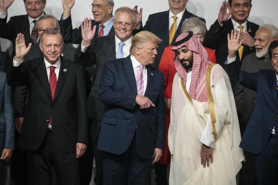 U.S. President Donald Trump speaks with Saudi Crown Prince Mohammad Bin Salman on the first day of the G20 summit in Osaka, Japan, in June 2019. (Photo: Anadolu Agency via Getty Images)