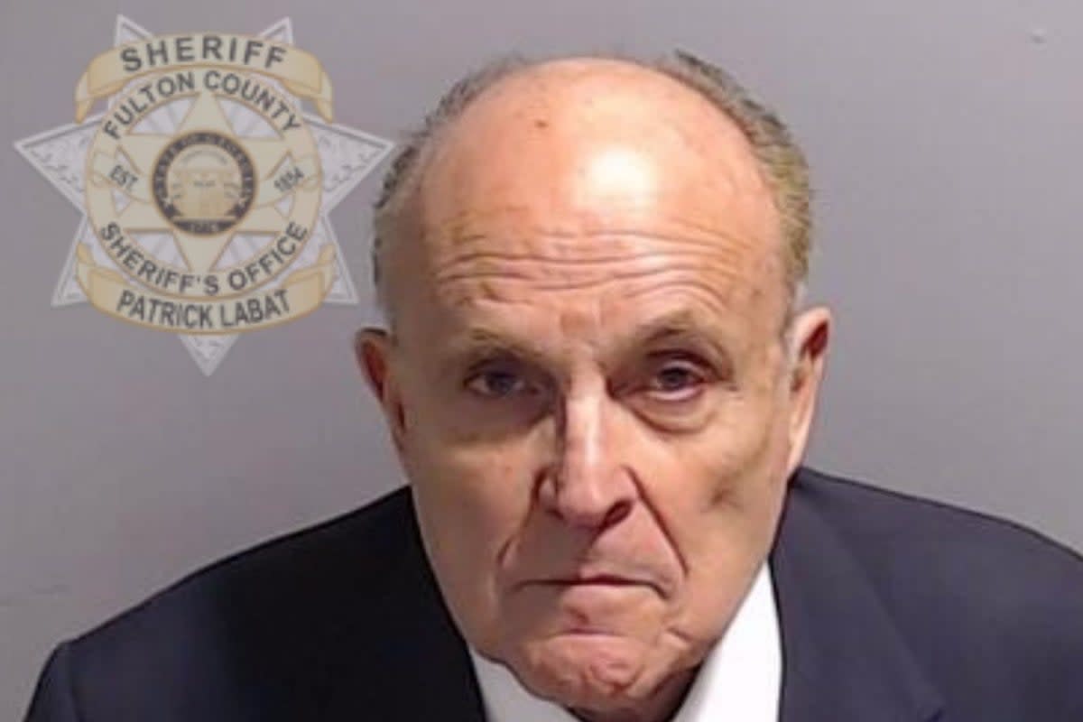 Rudy Giuliani pictured in mugshot (EPA)