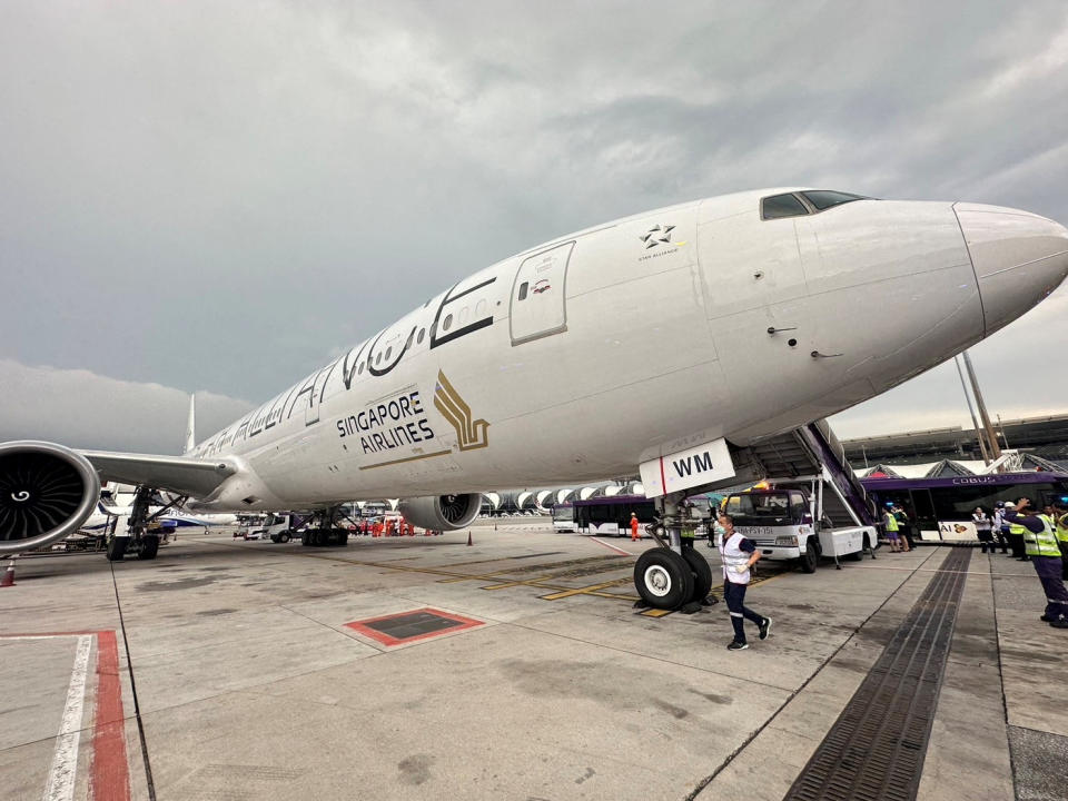 A Singapore airline aircraft is seen on tarmac after requesting an emergency landing at Bangkok's Suvarnabhumi International Airport, Thailand, May 21, 2024. Pongsak Suksi/Handout via REUTERS