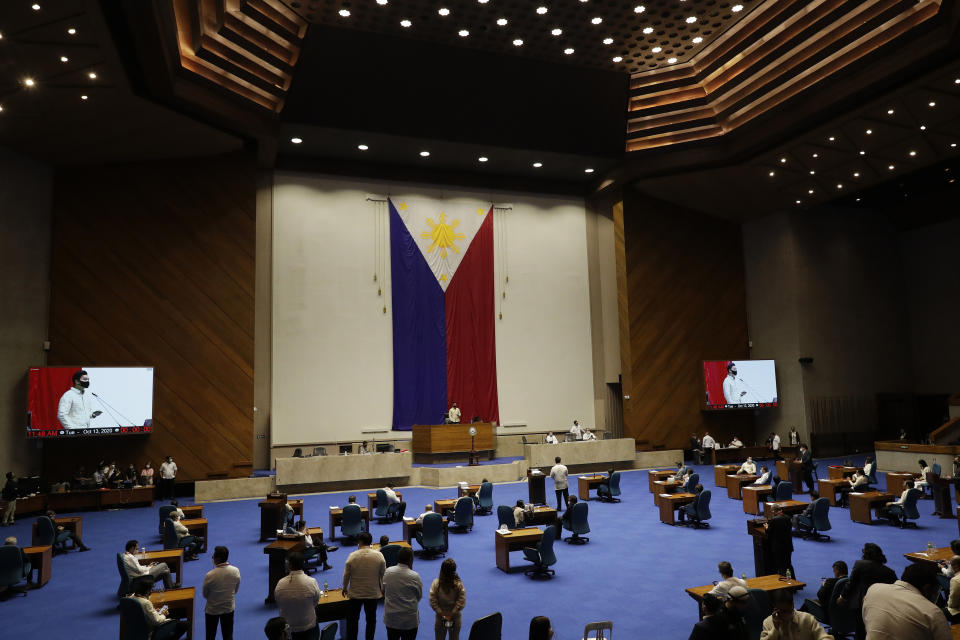 New house speaker Lord Allan Velasco bangs speaks during his first day at the House of Representatives in Quezon city, Philippines on Tuesday, Oct. 13, 2020. A large faction of Philippine legislators in the House of Representatives elected a new leader Monday in a tense political standoff between two allies of the president. (AP Photo/Aaron Favila)