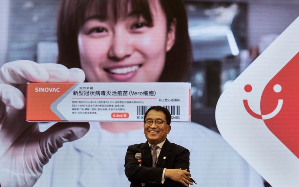 SinoVac Biotech CEO Yin Weidong speaks to journalists at the production site of their potential Covid-19 vaccine - Kevin Frayer /Getty Images AsiaPac 