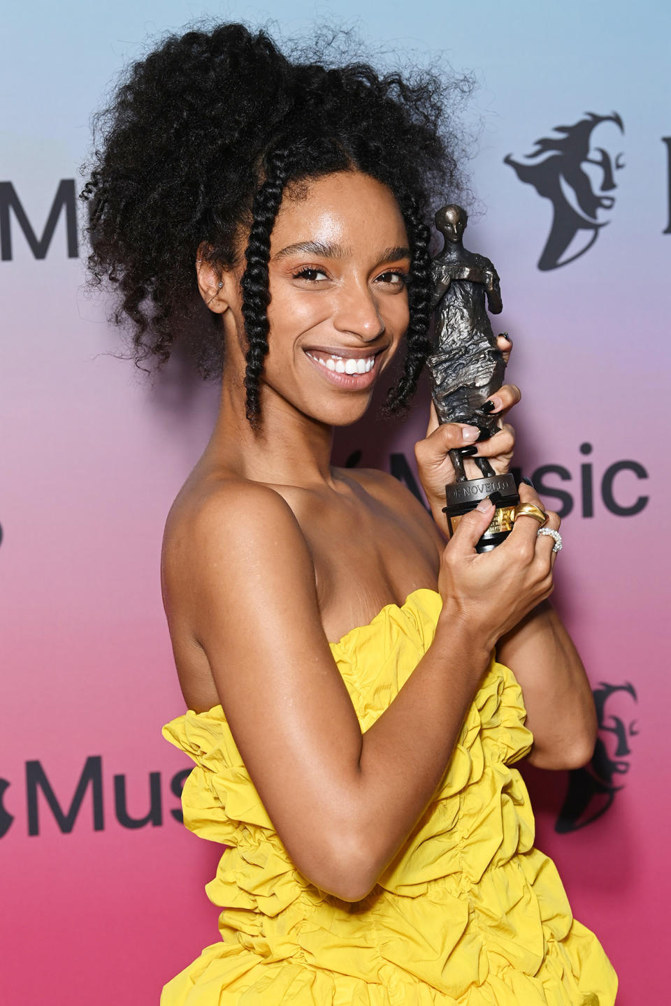<p>Lianne La Havas proudly shows off her award for best album on Sept. 21 at the Ivor Novello Awards in London. </p>
