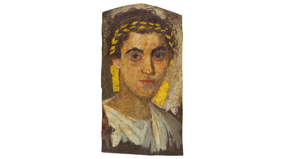 This portrait, painted circa A.D. 150, shows a man clothed in white and wearing a gold wreath.