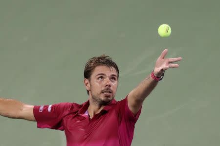 Sep 1, 2016; New York, NY, USA; Stan Wawrinka of Switzerland serves against Alessandro Giannessi of Italy (not pictured) on day four of the 2016 U.S. Open tennis tournament at USTA Billie Jean King National Tennis Center. Wawrinka won 6-1, 7-6(4), 7-5. Mandatory Credit: Geoff Burke-USA TODAY Sports