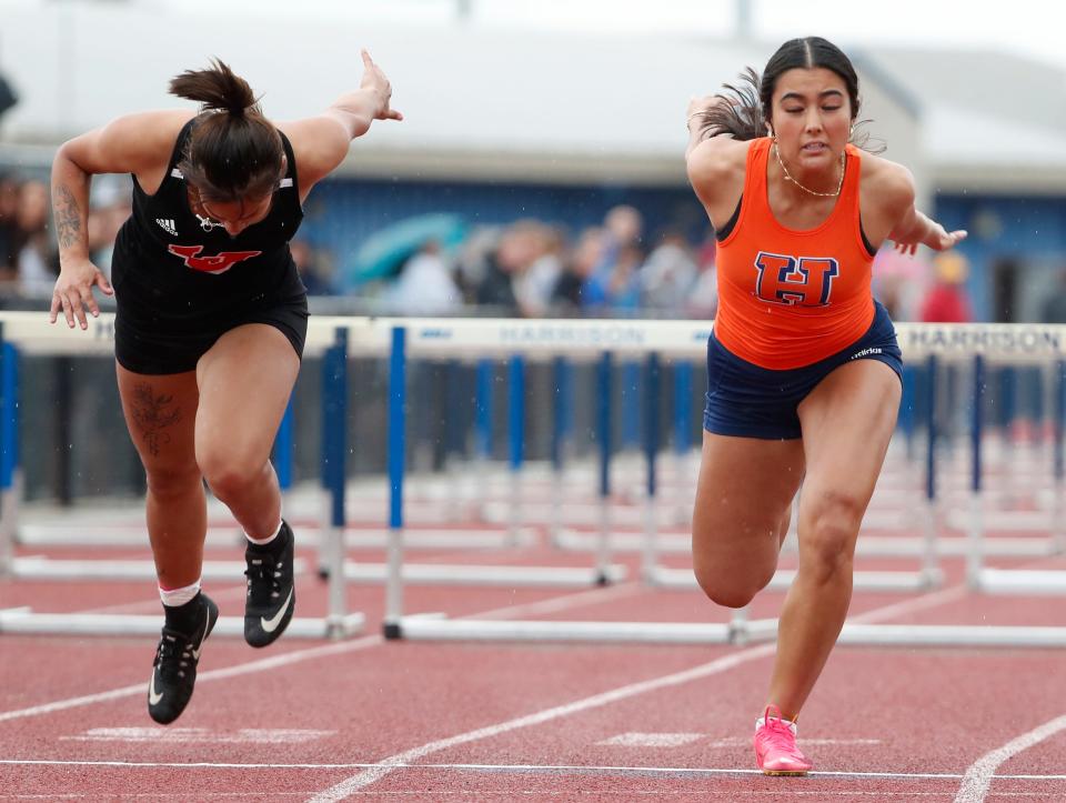 Lafayette Jeff Maria De La Cruz and Harrison Park Peterson compete in the 100m hurdles during the IIHSAA girls track and field sectional meet, Tuesday, May 14, 2024, at Harrison High School in West Lafayette, Ind.