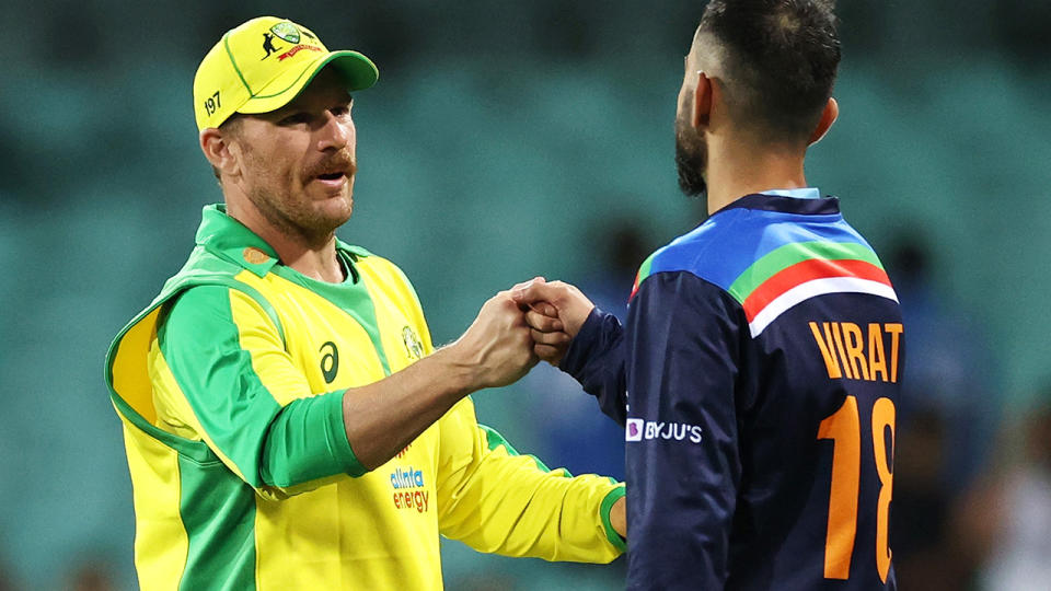 Aaron Finch and Virat Kohli, pictured here after the second ODI between Australia and India at the SCG.