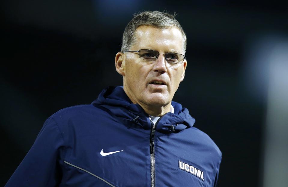 Connecticut head coach Randy Edsall comes off the field following an NCAA college football game against Boston College at Fenway Park in Boston, Saturday, Nov. 18, 2017. Boston College won 39-16. (AP Photo/Michael Dwyer)