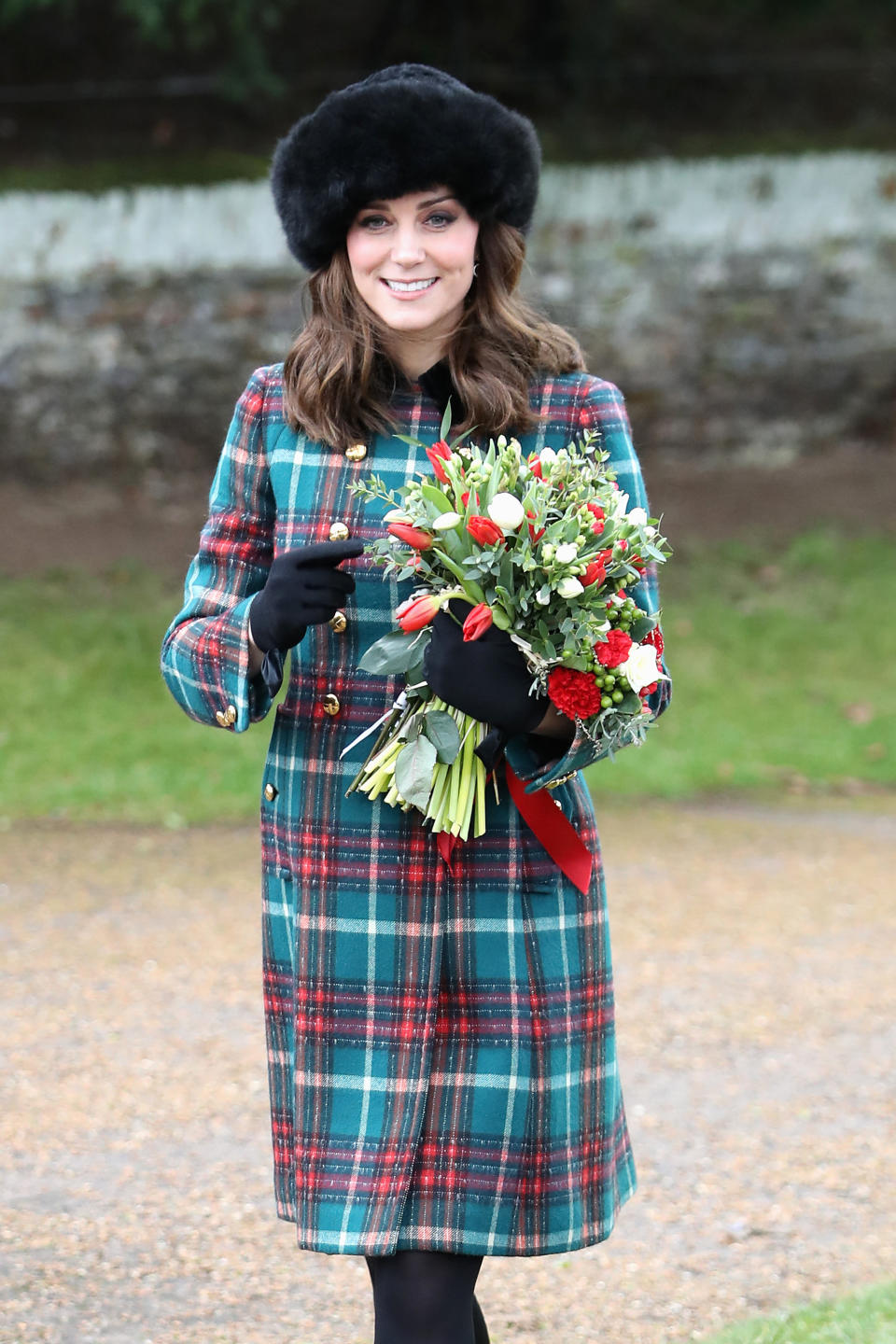 <p>The Duchess of Cambridge was presented with some festive flowers.</p>