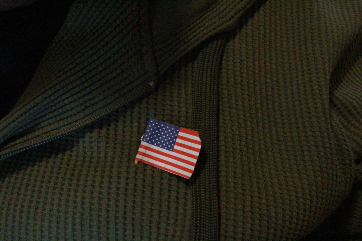 Luis arrived at a Sacramento restaurant wearing a green sweater. That’s his favorite color, he said, and reminds him of his time in the U.S. Army. (Justo Robles / NBC News)