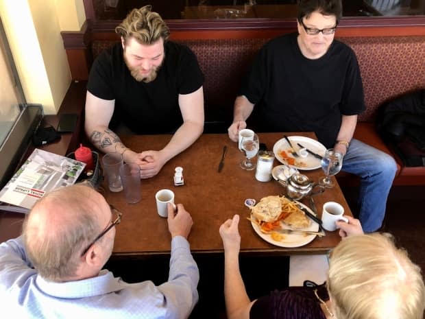 Customers are back for in-restaurant dining but table size is restricted to six people.