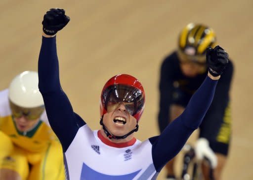 Britain's Chris Hoy celebrates after winning the gold medal in the men's keirin cycling final at the London Olympics on August 7. He won his sixth gold courtesy of victory in the keirin event which allowed him to overtake the five titles garnered by rower Steve Redgrave