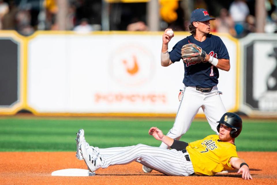 Southern Miss’s Slade Wilks is out as he slides into second base after the ball during the Super Regionals Final at Pete Taylor Park in Hattiesburg on Sunday, June 12, 2022.