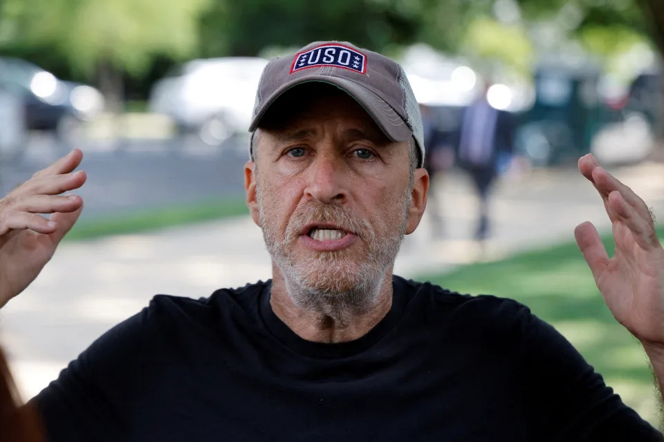 Jon Stewart speaks to reporters on Capitol Hill.