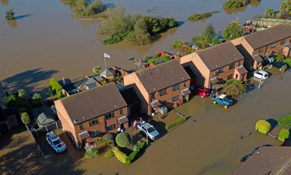 <span>Extreme weather, from wind damage to storms causing floods, has meant more homeowners have had to make a claim.</span><span>Photograph: Joe Giddens/PA</span>