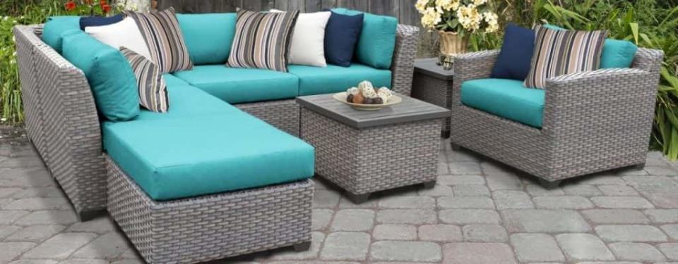 Merlyn 8 Piece Rattan Sectional Seating Group with Cushions