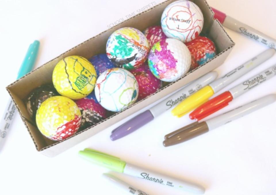 <p>Schooltime Snippets</p><p>All you need is markers and a golf ball for this easy but messy gift for the golfer dad in your life. Read the tutorial on <a href="https://www.schooltimesnippets.com/2017/11/easy-kid-made-gift-colored-golf-balls.html" rel="nofollow noopener" target="_blank" data-ylk="slk:Schooltime Snippets;elm:context_link;itc:0;sec:content-canvas" class="link ">Schooltime Snippets</a> to learn more about how to make dad’s next round of golf colorful!</p>