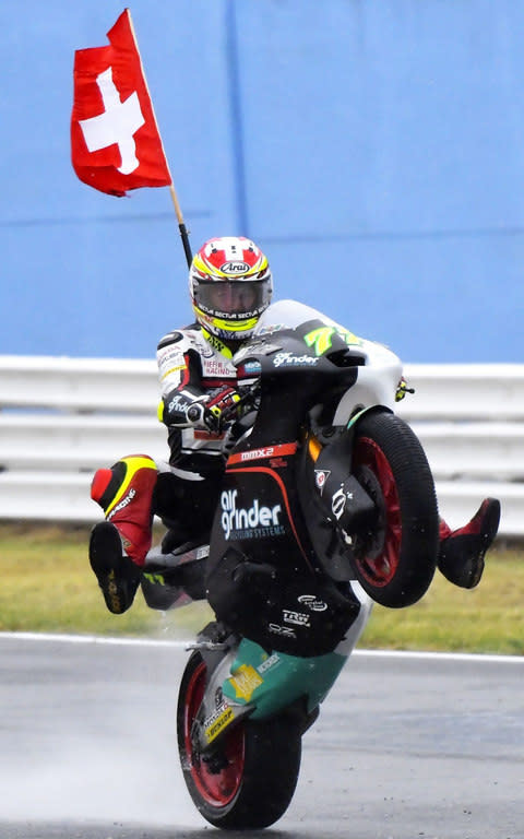 Dominique Aegerter celebrates his victory at Misano - Credit: MARCO BERTORELLO /AFP