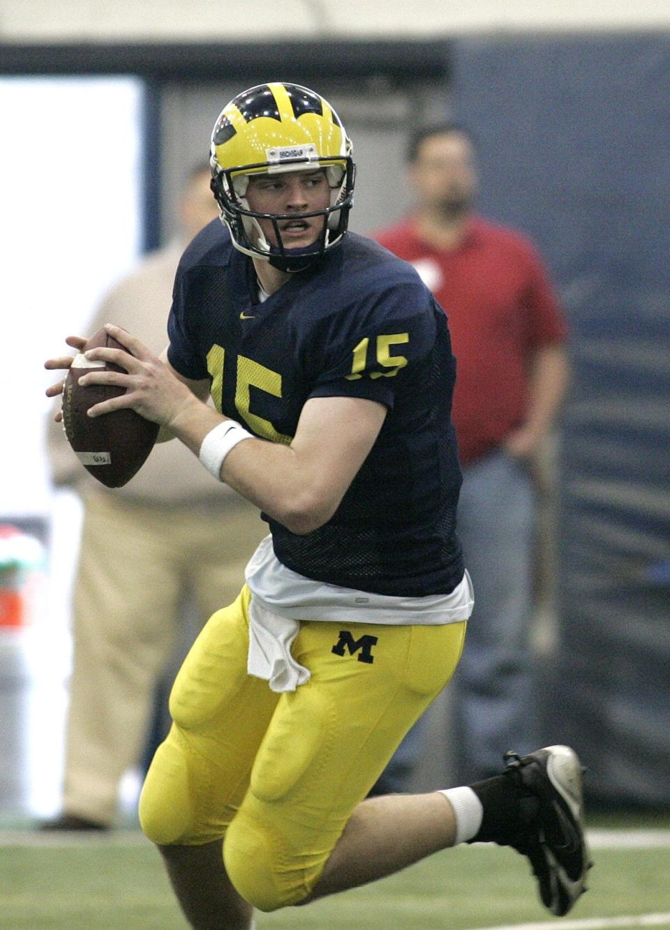 Michigan quarterback Ryan Mallett runs with the football during a spring practice session on Saturday, March 17, 2007, in Ann Arbor.