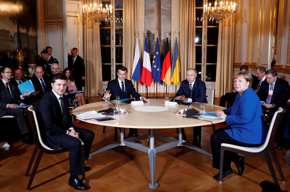 Image: Volodymyr Zelenskiy, Emmanuel Macron, Vladimir Putin and Angela Merkel (Ian Langsdon / Reuters file)