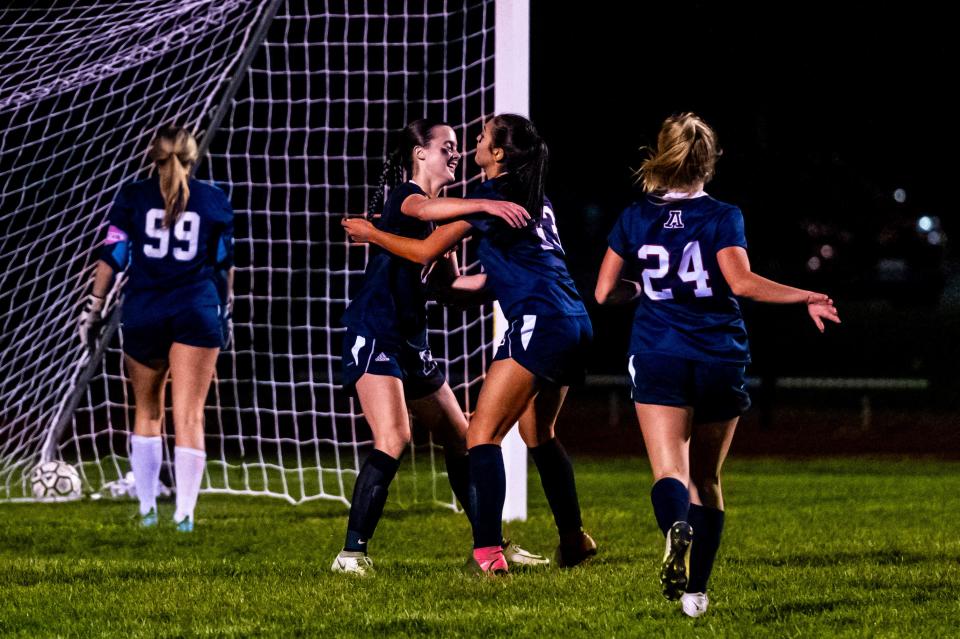 Apponequet reacts to the goal scored by Morgan Hayward.