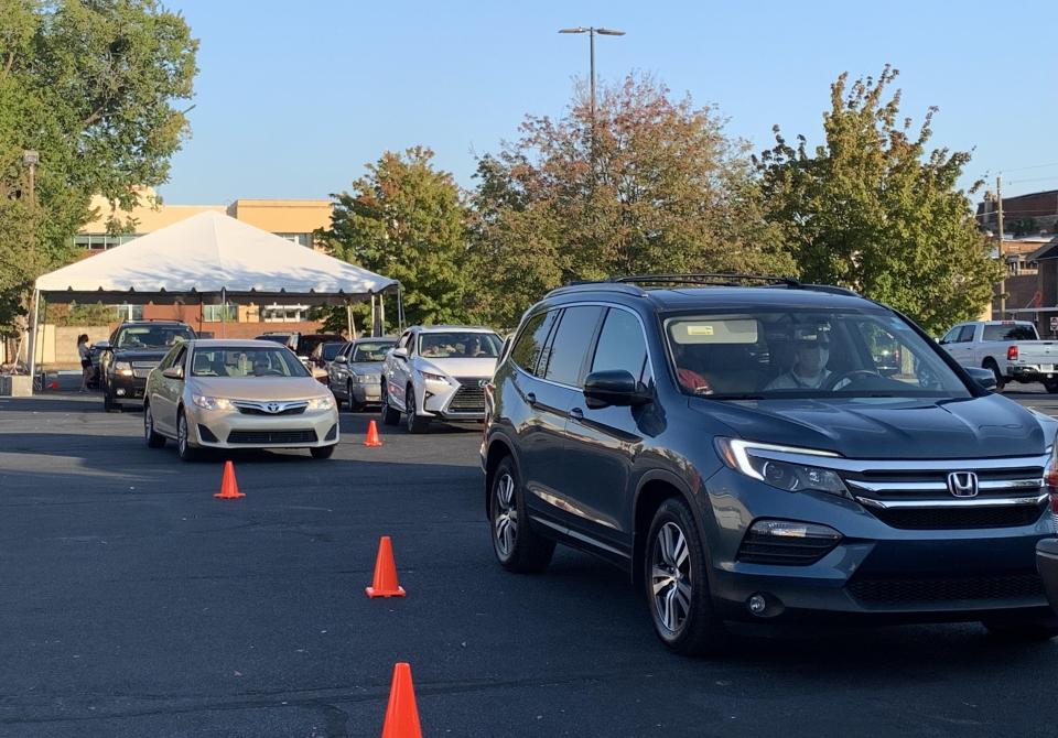 Vehicles line up in the parking lot of Holy Trinity Greek Orthodox Church to pick up dinner at a socially-distant Greek Festival in fall 2020. The drive-thru is being discontinued with the full festival, but meals can be ordered through Augusta To Go.