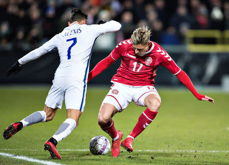 Denmark's Jens Stryger Larsen and Chile's Alexis Sanchez in action during an international friendly soccer match between Denmark and Chile at Aalborg Portland Park, in Aalborg, Denmark March 27, 2018. Scanpix Denmark/Henning Bagger/via REUTERS