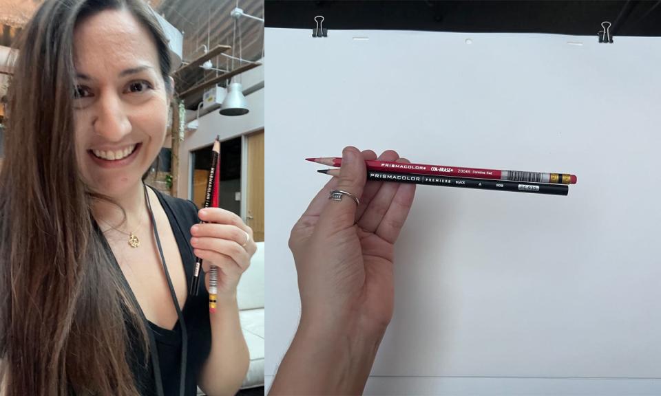 Kirsten Acuna holds Prismacolor pencils above a sketchpad.