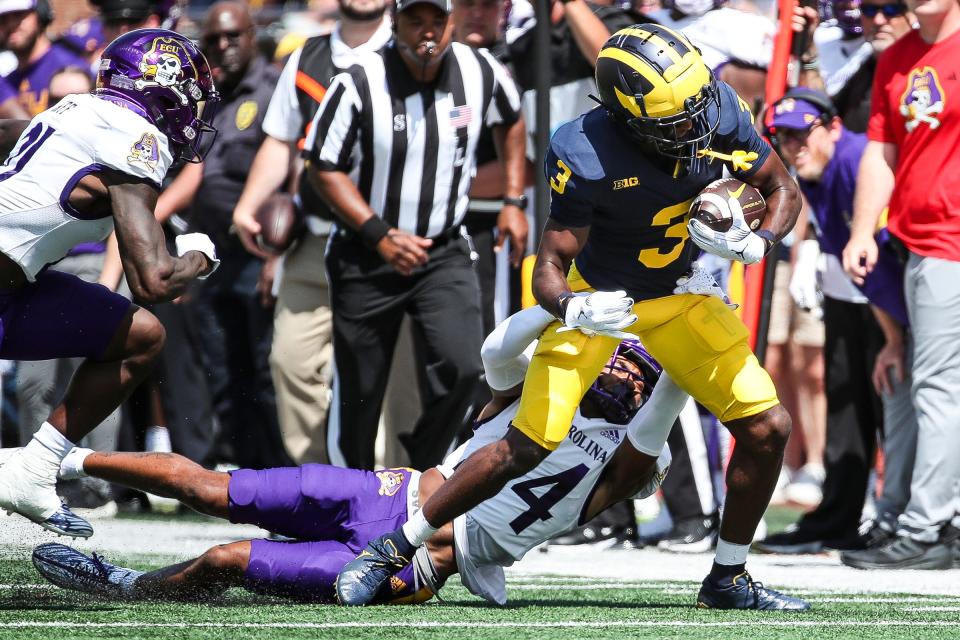 Michigan wide receiver Fredrick Moore (3) runs against East Carolina defensive back TyMir Brown (24) during the first half at Michigan Stadium in Ann Arbor on Saturday, Sept. 2, 2023.