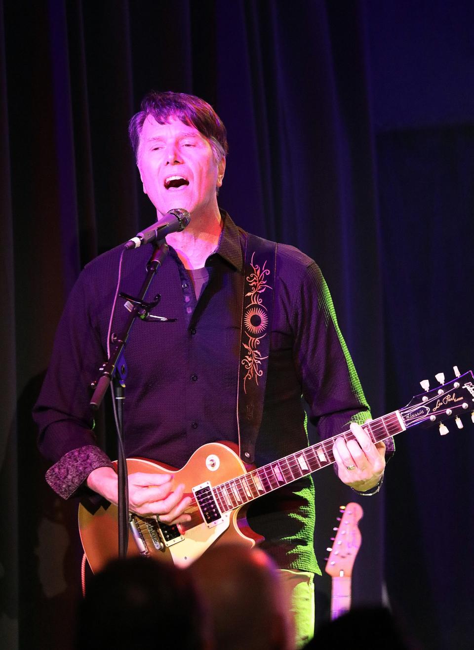 Kyle Warden plays guitar as The Rathbones reunite for a special concert at xBk Live, 1159 24th St. in Des Moines, on Friday, Oct. 27, to celebrate their 2023 induction into the Iowa Rock ‘n Roll Hall of Fame.