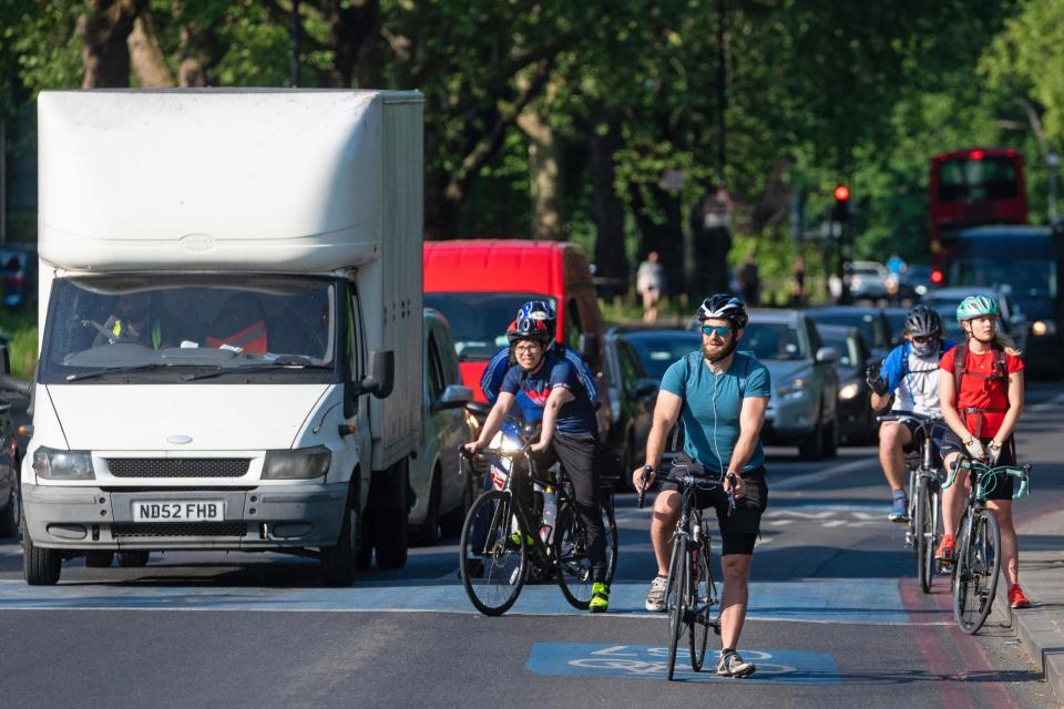 Londoners are taking up cycling in droves during the lockdown but traffic is steadily returning to London roads (PA)