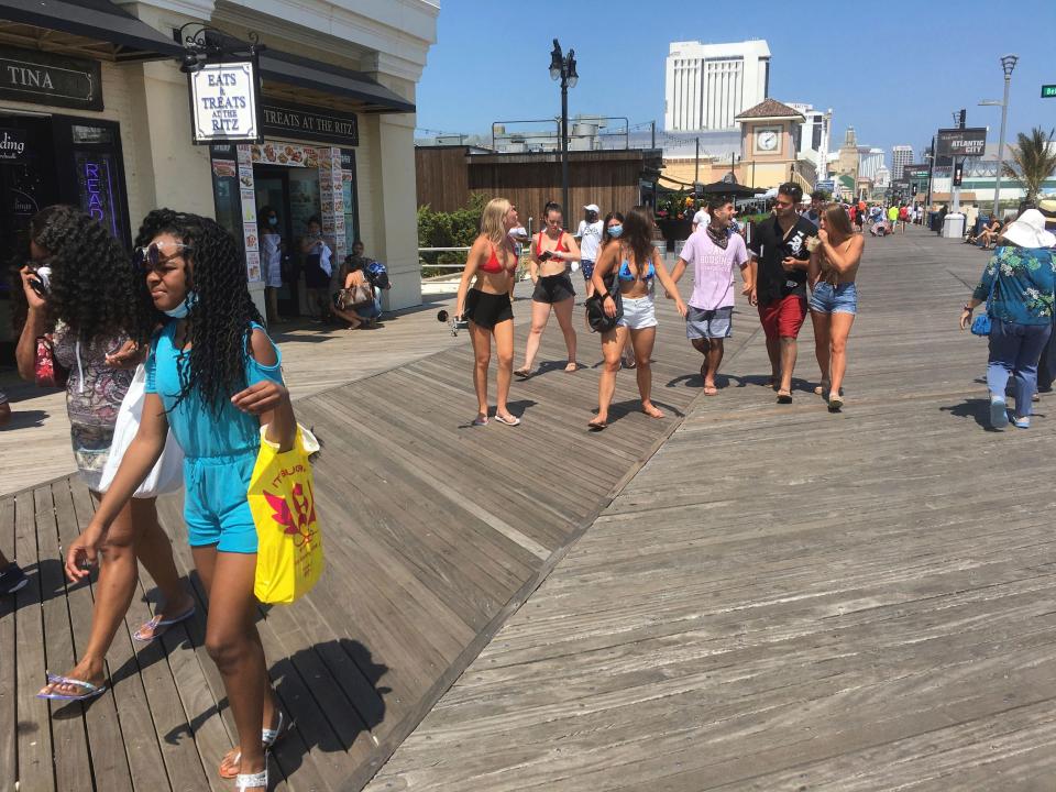 Atmosphere on the boardwalk in Atlantic City, New Jersey as hotels and casinos reopen for the Independence Day Holiday Weekend as certain restrictions are eased in New Jersey during the worldwide coronavirus pandemic. Although some casinos will reopen, there will be bans on indoor dining, smoking and drinking in all Atlantic City casinos until further notice