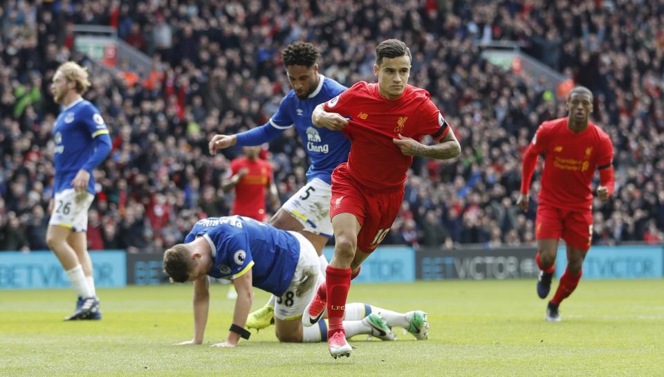 <p>Liverpool’s Philippe Coutinho celebrates scoring their second goal </p>