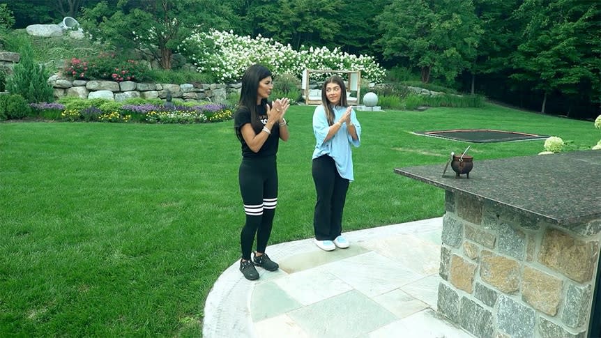 Teresa Giudice and Gia Giudice dancing in their backyard.