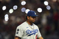 Los Angeles Dodgers pitcher Brusdar Graterol walks off the mound after being relieved in the sixth inning in Game 6 of baseball's National League Championship Series against the Atlanta Braves Saturday, Oct. 23, 2021, in Atlanta. (AP Photo/Brynn Anderson)