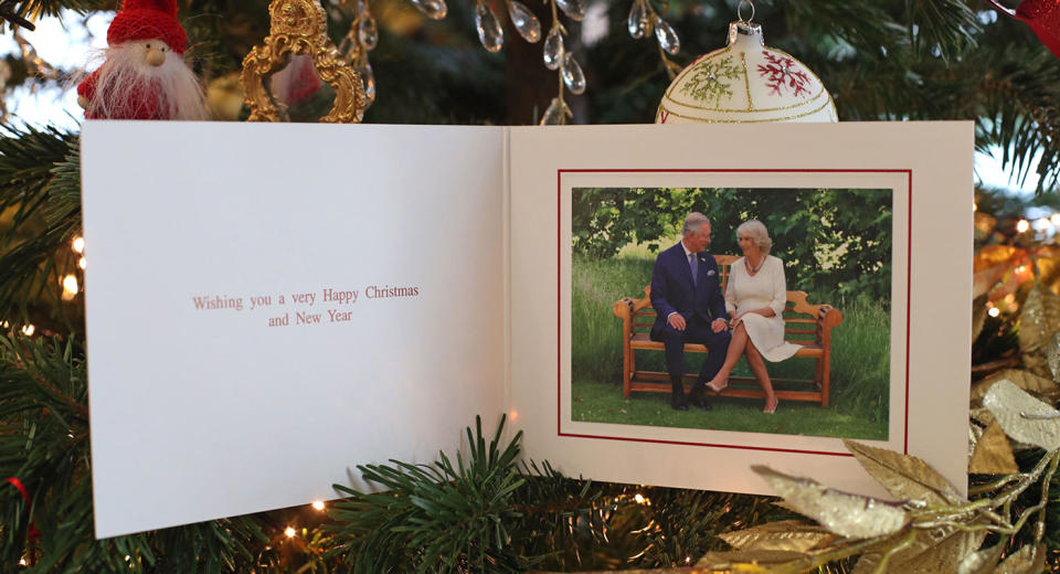 The 2018 Christmas card of the Prince of Wales and Duchess of Cornwall on a Christmas tree in Clarence House, London. The card features a photograph of the royal couple, taken by Hugo Burnand in the gardens of Clarence House. Photo: PA