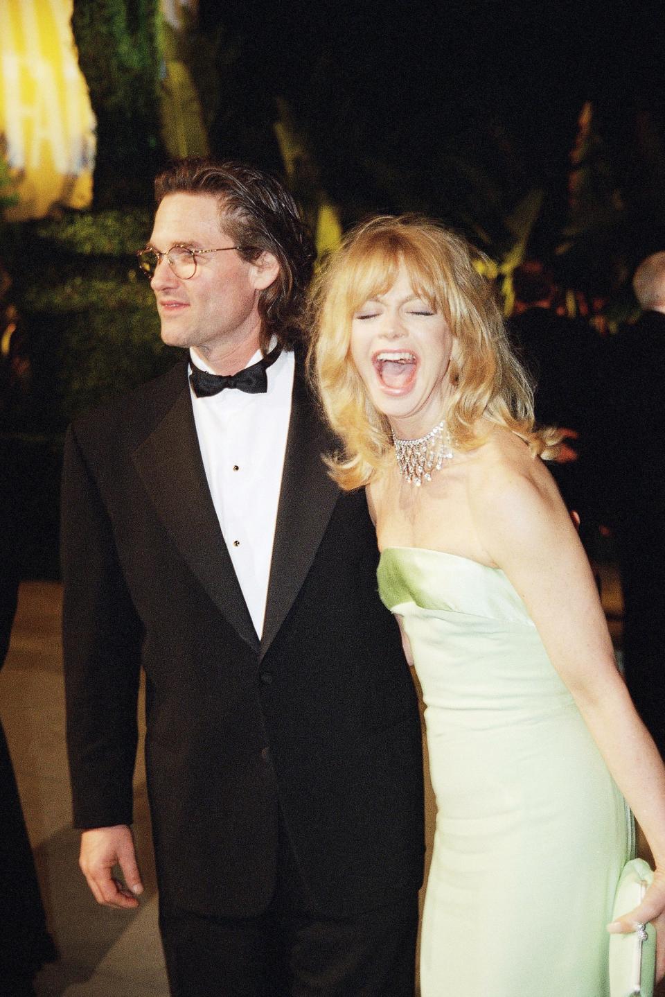 Kurt Russell and Goldie Hawn arrive at the Vanity Fair post-Oscar bash at Morton's in West Hollywood, Calif., on Monday, March 25, 1996.