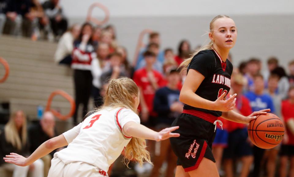 West Lafayette Red Devils Dylan Kastens (3) defends Rensselaer Central Bombers Taylor Van Meter (13) during the IU Health Hoops Classic Girl’s Basketball Championship, Saturday, Nov. 18, 2023, at Harrison High School in West Lafayette, Ind. Rensselaer Central Bombers won 58-53.