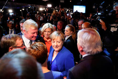 German Chancellor Angela Merkel of the Christian Democratic Union (CDU) leaves after the TV debate with her challenger Germany's Social Democratic Party SPD candidate for chancellor Martin Schulz in Berlin, Germany, September 3, 2017. REUTERS/Fabrizio Bensch