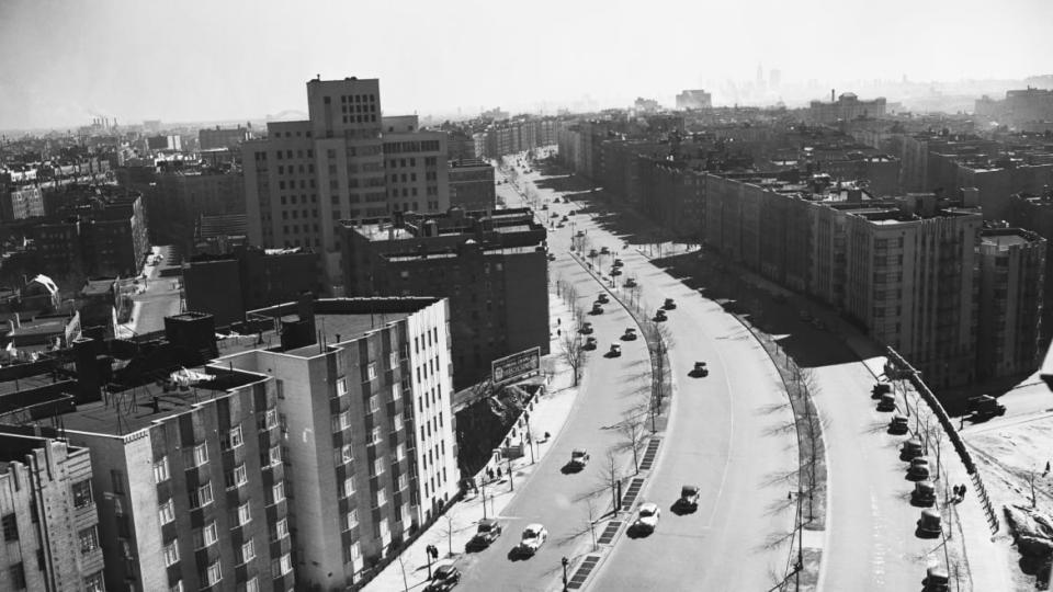 <div class="inline-image__caption"><p>"Most impressive thoroughfare in the Bronx, and one of the most beautiful in the city, is the Grand Concourse, which bisects the borough. It is lined for miles by apartment houses which command premium rentals. The concourse is a route northward to New England."</p></div> <div class="inline-image__credit">Bettmann/Getty Images</div>