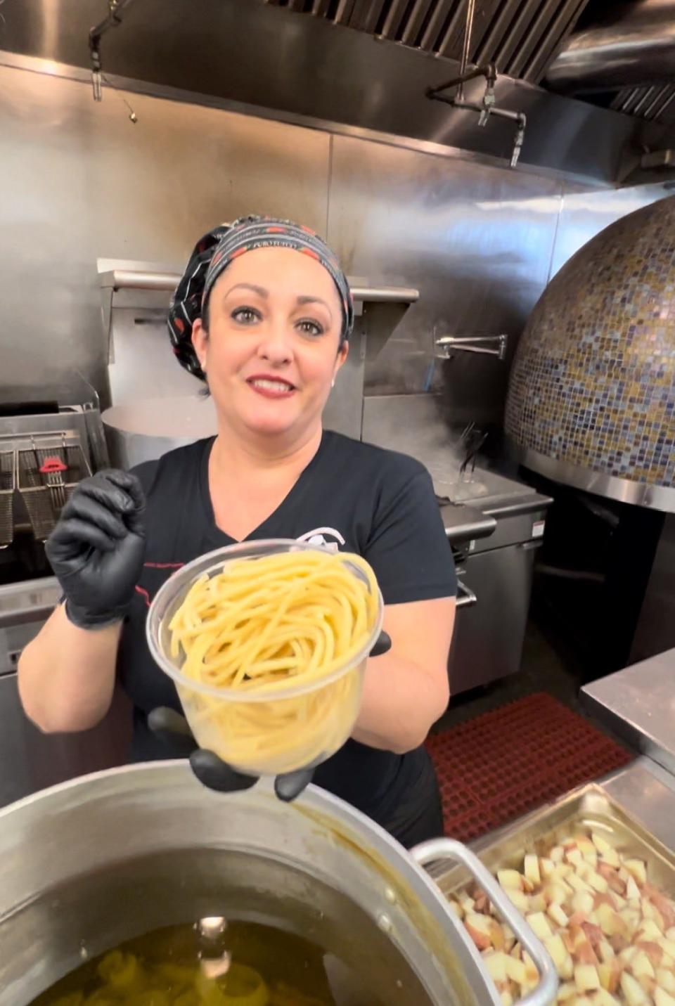 Tutti Da Gio chef/owner Giovanna Orsino shows some of the housemade pasta the Sicilian restaurant serves