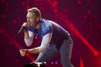 FILE - Chris Martin of Coldplay performs at Metlife Stadium in East Rutherford, N.J. on August 1, 2017. Coldplay's "Everyday Life" is nominated for a Grammy Award for best album. The 63rd Annual Grammy Awards will be held on March 14. (Photo by Scott Roth/Invision/AP, File)