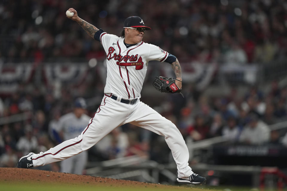 Atlanta Braves relief pitcher Jesse Chavez throws during the third inning in Game 2 of baseball's National League Championship Series Sunday, Oct. 17, 2021, in Atlanta. (AP Photo/Brynn Anderson)