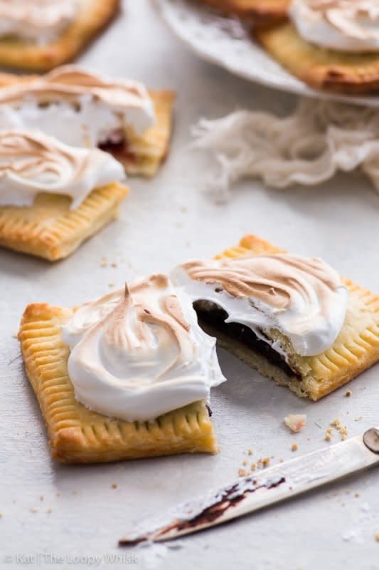 <p>The Loopy Whisk</p><p>Take the humble pop tart to new heights: make S’mores pop tarts by stuffing them with chocolate and smothering them with marshmallow meringue frosting.</p><p><strong>Get the recipe: <a href="https://theloopywhisk.com/2018/09/12/smores-pop-tarts/" rel="nofollow noopener" target="_blank" data-ylk="slk:S'mores Pop Tarts;elm:context_link;itc:0;sec:content-canvas" class="link rapid-noclick-resp"><em>S'mores Pop Tarts</em></a></strong></p>