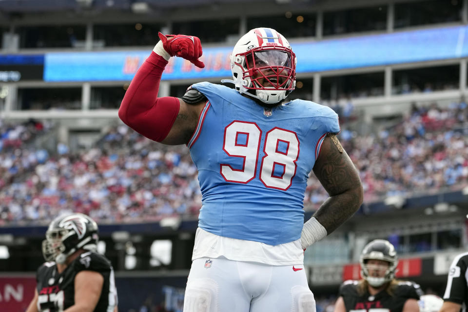 Tennessee Titans defensive tackle Jeffery Simmons (98) gestures after a defensive stop against the Atlanta Falcons during the first half of an NFL football game, Sunday, Oct. 29, 2023, in Nashville, Tenn. (AP Photo/George Walker IV)