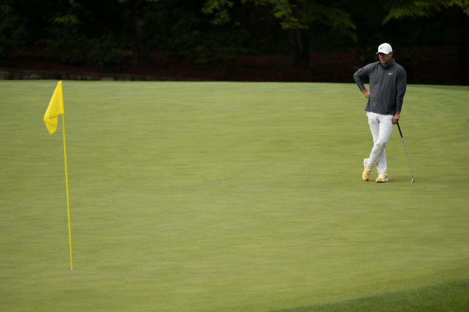 Brooks Koepka waits to putt on the 11th hole during the weather delayed third round of the Masters golf tournament at Augusta National Golf Club on Sunday, April 9, 2023, in Augusta, Ga. (AP Photo/David J. Phillip)