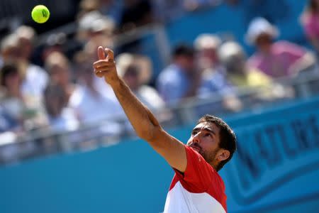 Tennis - ATP 500 - Fever-Tree Championships - The Queen's Club, London, Britain - June 24, 2018 Croatia's Marin Cilic in action during the final against Serbia's Novak Djokovic Action Images via Reuters/Tony O'Brien